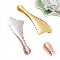 Rouleau facial et Gua Sha 2 en 1 en alliage de zinc, bâton de massage anti-rides pour le visage et les yeux