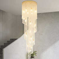 Lustre en spirale lumineux pour grand escalier, décoratif pour villa et duplex, avec rideaux perlés et cristal