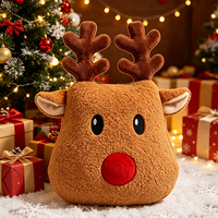 Coussin décoratif de Noël en peluche 3D en polyester en forme de tête de renne avec yeux brodés et nez rouge