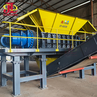 Kowloon Machinery Dubbelassige Biomassa Shredder voor Kokosnootschil, Rijststro, Palmolievezels, Hoge Productiviteit Motor & Motorblok