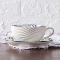 Assiettes à dîner en céramique bleue et blanche, prix d'usine en gros, forme de plante, vaisselle en céramique chinoise