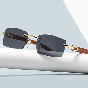 Nouvelles Lunettes de Soleil Carrées Sans Monture Tendance et Légères UV400, Montures Grises et Beiges, Style Classique et Personnalisé pour Adultes - Product Image 1