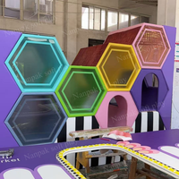 Équipement de terrain de jeux intérieur attrayant en nid d'abeille, toboggan sensoriel, équipement de jeu souple pour les écoles, les centres commerciaux et les cafés