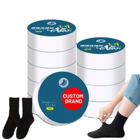 Chaussettes de compression en coton jetables OEM/ODM Chaussettes jetables unisexes pour les activités de plein air Voyage Hôtel Respirant Comprimé