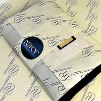 Papier d'emballage cadeau imprimé estampage or 17gsm personnalisé papier de soie personnalisé avec logo de marque pour l'emballage de vêtements/fleurs