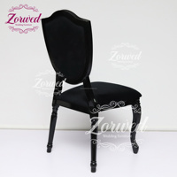 Chaise de salle à manger noire de luxe gothique moderne en gros, dossier bouclier à boutons en cristal, chaises de mariage en velours noir de style français pour hôtel