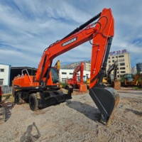 Excavatrice sur pneus Doosan DX210W-9C d'occasion de 20 tonnes, faible nombre d'heures de fonctionnement, expédition mondiale, en stock à vendre