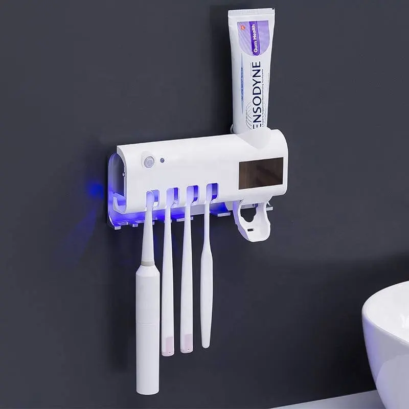 Amazon Hot Sell Multi-functional Electric Automatic Toothpaste Dispenser UV Toothbrush Holder Bathroom Organizer Wall