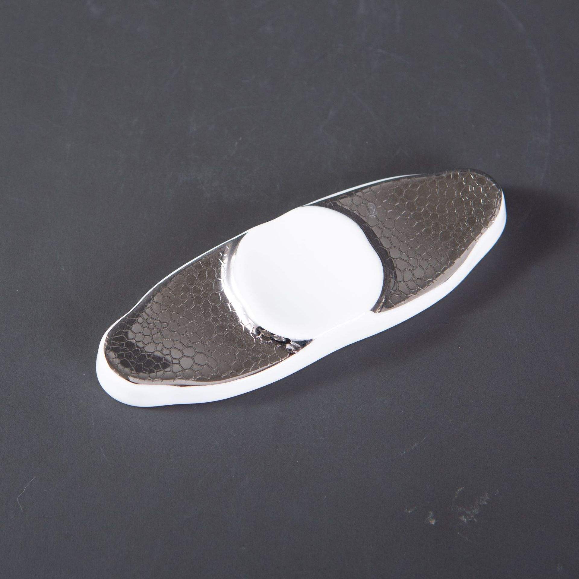 Silver chopstick holder