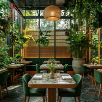 Ensemble de sièges en velours vert foncé modernes et droits, avec chaise en cuir, structure en bois, table en marbre, mobilier pour salle à manger, hôtel, restaurant