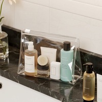 Sac de toilette transparent en PVC avec logo personnalisé, fermeture éclair étanche, pochette cosmétique transparente, approuvé par la TSA, sac de rangement pour maquillage de voyage pour femmes