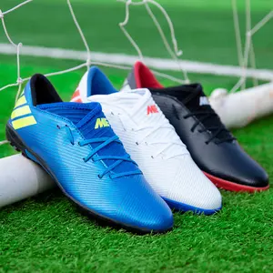 Logotipo personalizado Hombres Fútbol Césped Zapatillas de deporte Zapatos de entrenamiento Niños Botas al aire libre