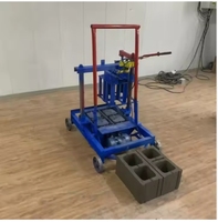 Machine manuelle compacte pour la fabrication de blocs de pavé creux en ciment 2-45 avec moteur et composants centraux stables