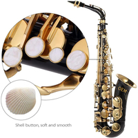 Saxophone Alto Mi Bémol Professionnel Fait Main en Laiton Noir et Or Sculpté, Vente en Gros d'Usine Chinoise, Sans Marque Personnalisée (OEM), avec Étui