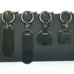 Vente en gros de porte-clés en métal personnalisé arrondi par sublimation accessoires promotionnels porte-clés en fibre de carbone