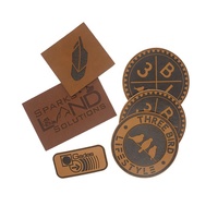 Échantillonnage rapide vêtements patchs usine logo en relief personnalisé étiquettes en cuir véritable avec adhésif