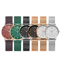 Montre à quartz pour femme Shengke K0006L, style coréen, design simple et mignon, boîtier en alliage et bracelet en acier inoxydable, cadran en verre.