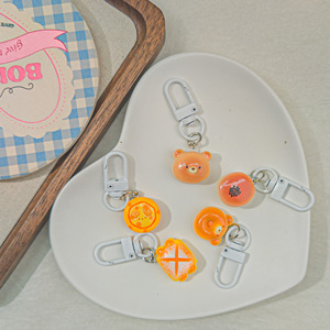 <span class=keywords><strong>Mini</strong></span> Chaveiro de Pelúcia com Formato de Urso, Pudim, Torta de Ovo, Brinquedo Comestível, Pingente de Personagem Fofo para Acessório de Bolsa, Presente, Enfeite para Pendurar - Product Image 1