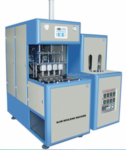 Soffiatrice per bottiglie soffiatrice per bottiglie semiautomatica a 4 cavità con caricamento automatico di preforme per acqua pura e Jui - Product Image 1