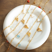 Collier créatif en acier titane plaqué or 18 carats avec perle d'eau douce, pendentif cœur et fleur de lotus, bijou botanique unique pour femme