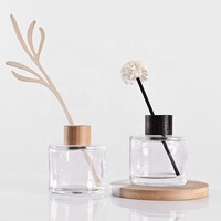 Récipient de diffuseur d'aromathérapie en verre rond Bouteilles de parfum vides de haute qualité avec emballage en carton avec bouchon en bois