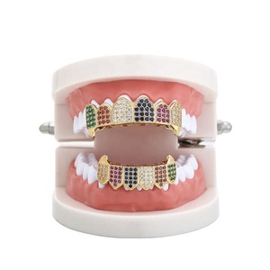 <span class=keywords><strong>Real</strong></span> ouro chapeamento latão e seis cores diferentes zircão hip hop fang dentes grillz com caso embalado - Product Image 1