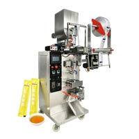 Machine d'emballage VFFS pour liquides et pâtes avec trémie agitateur, film plastique motorisé, haute précision, portable, pour sachets individuels de miel