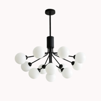 Lustre LED suspendu moderne et créatif en fer noir avec boule de verre, idéal pour villa et salon, style luxe