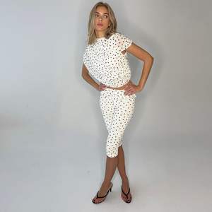 ชุดเซ็ตเสื้อครอปคอสูงลายจุดพร้อมกางเกงขายาวผ้าตาข่ายซีทรูสำหรับผู้หญิงจาก Voikerdr เหมาะสำหรับใส่ไปเที่ยวคลับ - Product Image 5