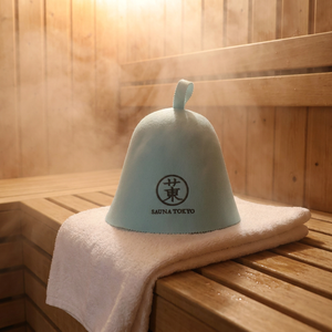Un genial gorro de sauna de lana merino color verde azulado <span class=keywords><strong>que</strong></span> transmite el espíritu de Tokio mientras el vapor se agacha ante él. - Product Image 1