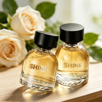 Flacon de parfum élégant et transparent de qualité supérieure, 30 ml, 50 ml, 100 ml, flacon en verre vide avec pulvérisateur à pompe et impression sérigraphique, bouchon noir