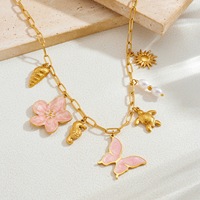 Collier en acier inoxydable plaqué or 18 carats avec pendentifs papillon rose, fleur, hippocampe, tortue, perle – Bijoux d'été côtiers anti-ternissement