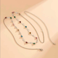 Vente en gros d'usine de bijoux chaîne de ventre OEM Boho cristal coloré coeur chaîne de ventre en acier inoxydable hypoallergénique ventre taille Cha