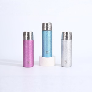 Vaso Térmico de Titanio Puro 316SS con Doble Pared y Aislamiento al Vacío, Infusor de Té, Textura Martillada, Taza de Viaje para Auto, Portátil y de Lujo - Product Image 1