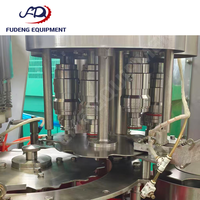 Machine de remplissage 99 % neuve à 24 têtes, contrôlée par PLC, haute performance, 12 000 bph pour bouteilles en plastique, eau pure et boissons