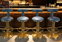 Tabouret de bar en acier inoxydable de style luxueux à rotation à 360 degrés pour hôtel et restaurant