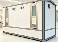 Toilettes préfabriquées en conteneur, mur texturé en brique, équipement sanitaire complet, chasse d'eau, compostage à sec, porte d'intimité pour zones panoramiques