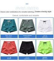 Short Décontracté de Sport pour Homme Séchage Rapide Respirant en Tissu Mesh Trois-Quarts Grand Short de Gym pour Homme