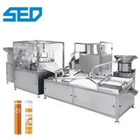Machine automatique de comptage, de remplissage, de bouchage et d'emballage de comprimés effervescents de vitamine C de haute précision en bouteilles et tubes en plastique pour l'alimentation et les boissons