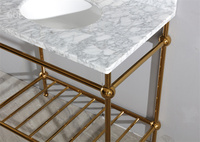Meuble-lavabo en acier inoxydable avec comptoir en marbre et tabouret de salle de bain doré