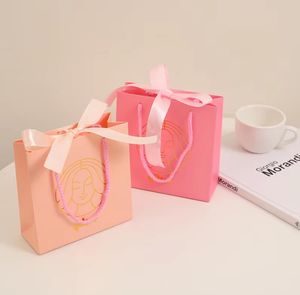 Bolsas de Papel Rosa Impresas Personalizadas al por Mayor, Diseña Tu Propio Logotipo para Empaque de Regalos de Ropa y Calzado - Product Image 3