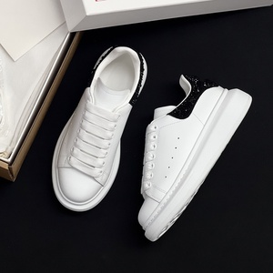 Zapatillas de lujo de diseñador con diamantes negros para hombre, estilo casual, punta redonda, para mujer, estilo retro clásico, con suela gruesa - Product Image 1