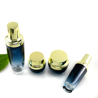 Lot de contenants cosmétiques haut de gamme en verre bleu dégradé, flacon pompe pour lotion, pot de crème pour le visage, gravure et marquage à chaud pour soins de la peau