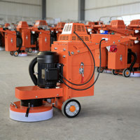 Machine professionnelle de ponçage de sols en béton et terrazzo avec moteur électrique pour la finition des surfaces en pierre