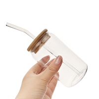 Vente en gros de canettes en verre borosilicate résistant à la chaleur et au froid, verres à bière avec couvercles en bambou et paille