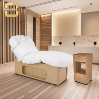 Lit de massage médical à hauteur réglable de clinique Beauté du dossier chauffant pour 4 moteurs Fournisseur de table de traitement de spa électrique complet