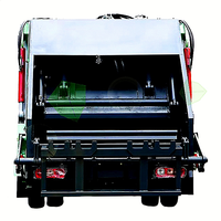 Camion poubelle à compression bidirectionnelle