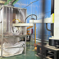 Robot otomatis untuk membongkar palet dan membuka kemasan, memungkinkan pembongkaran bubuk sodium sulfat dalam kemasan kantong tanpa debu.