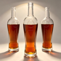 Bouteille en verre transparente ronde haute de 700 ml, personnalisée en usine, pour l'emballage de whisky, brandy, tequila, rhum et autres spiritueux