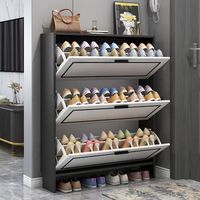 Meuble à chaussures moderne de luxe gris anthracite avec tiroirs inclinables et finition dorée, organisateur de rangement pour chaussures d'entrée et de couloir pour la maison